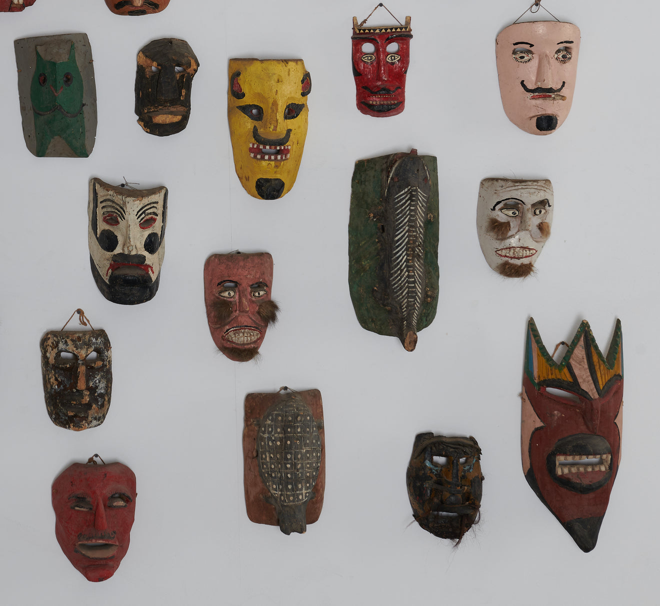 COLLECTION OF 62 CEREMONIAL MASKS